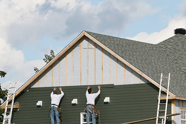 Professional Storm Damage Siding Repair technician working in Mount Holly, NC